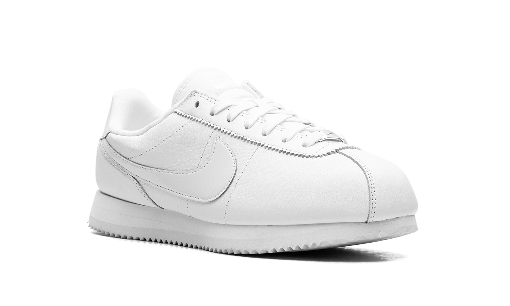 triple white nike cortez